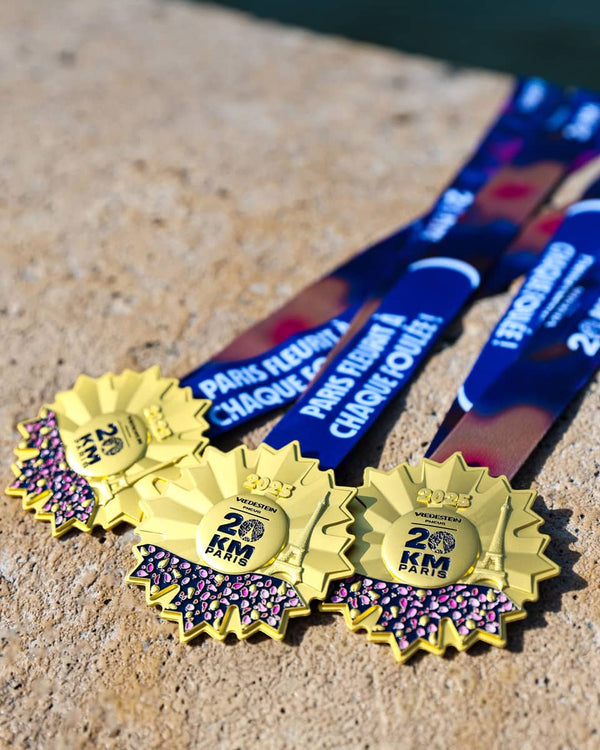 Parcours 20km Paris - Médaille Finisher - Crédits : Les 20 kilomètres de Paris & Antoine DECOTTIGNIES