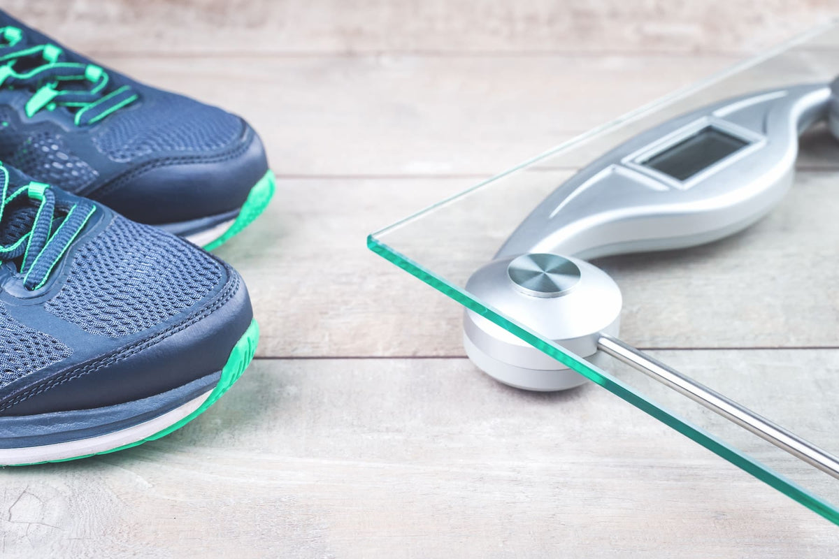 Baskets de running et balance - Courir fait-il perdre du poids ?